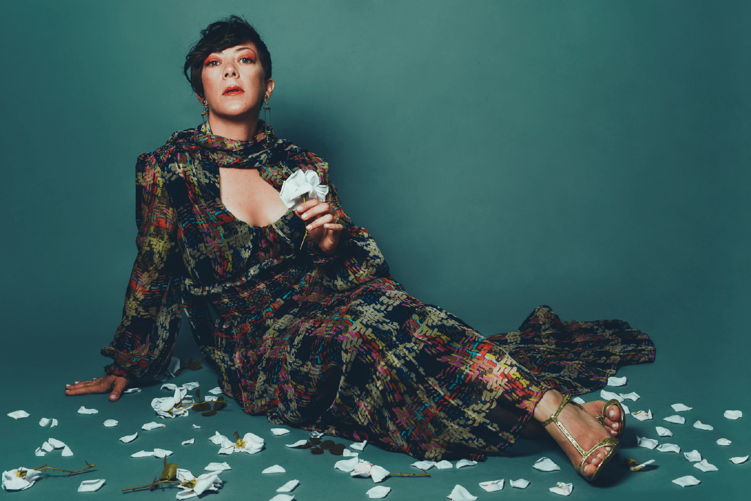 Gretchen Parlato amidst rose petals